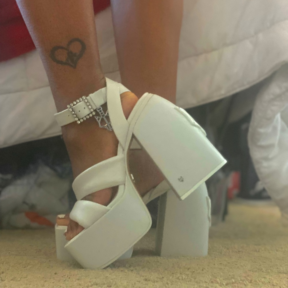 Never worn, fresh out of the box, original packaging included